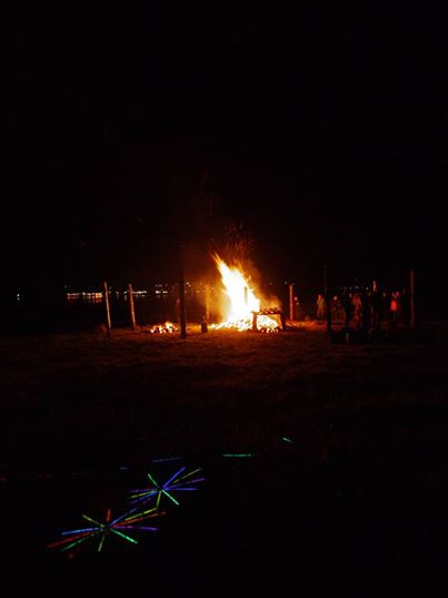 Spectators watching the burning circle